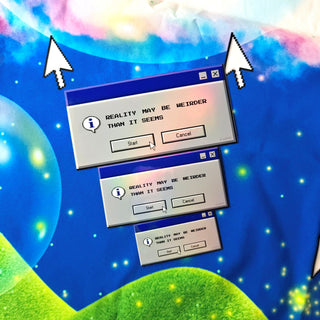 Computer dialog boxes with 'Reality may be weirder than it seems' text on a colorful, abstract background.
