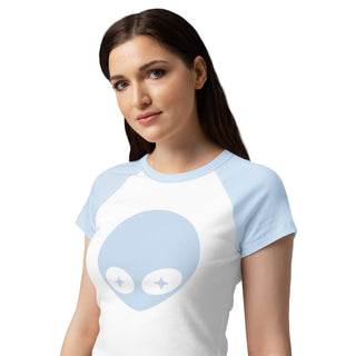 Woman wearing a white t-shirt with a blue alien face design on a plain background