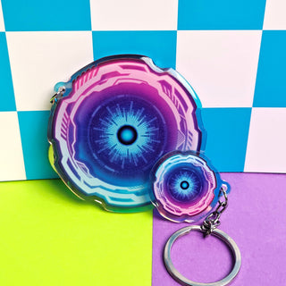 Colorful keychain with a geometric design on a multicolored checkered background