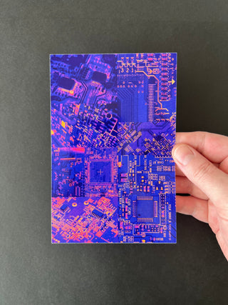 Vaporwave Circuits Print by AIPYR held by a human hand over a black background.