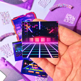 Hand holding a retro-style card with a neon grid design against a colorful, textured background.