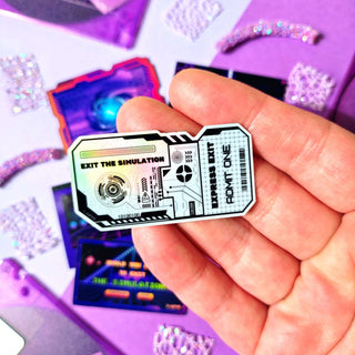 Hand holding a 'Exit the Simulation' sticker with colorful background