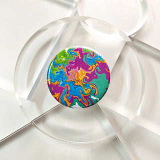Colorful lollipop with a swirl pattern on a white background