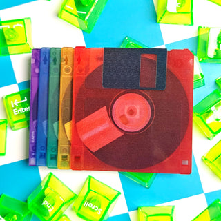 Rainbow floppy disk on a multicolored background