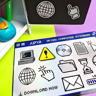 Sheet of retro computer stickers with various icons on a colorful background