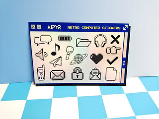 Sheet of computer stickers with various icons on a blue and white checkered background