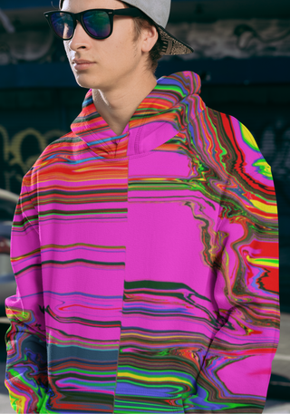 Person wearing a colorful hoodie with a blurred background