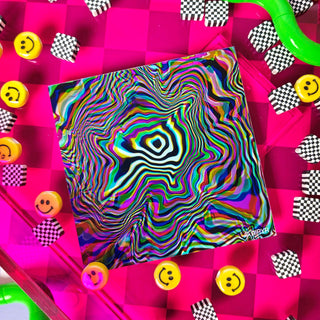Colorful psychedelic patterned product on a pink checkered background with smiley face and checkered border elements.