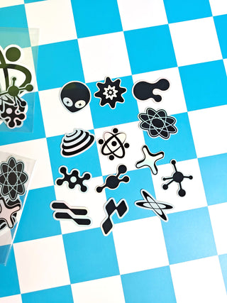 Black abstract designs on a blue and white checkered background