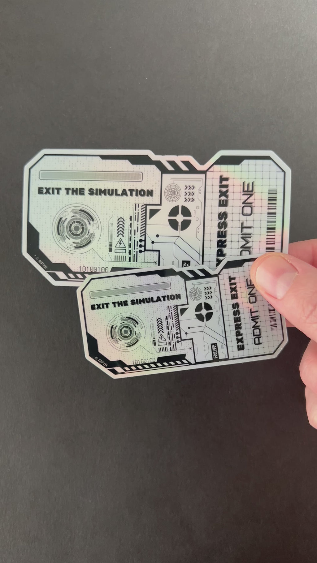 Video of the Exit the Simulation Ticket Holographic Sticker by AIPYR over a black background.