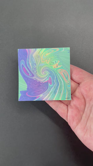 Video of the Psychedelic Glitch Holographic Sticker by AIPYR over a black background.