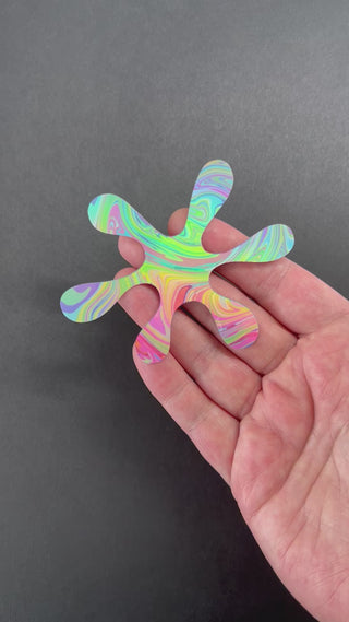 Video of the Bubblegum Splat Holographic Sticker by AIPYR.