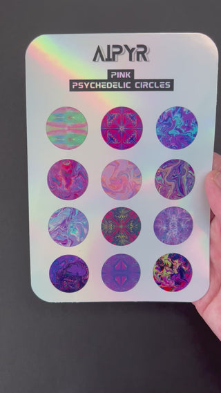 Video of the Pink Psychedelic Circles Holographic Sticker Sheet by AIPYR over a black background.